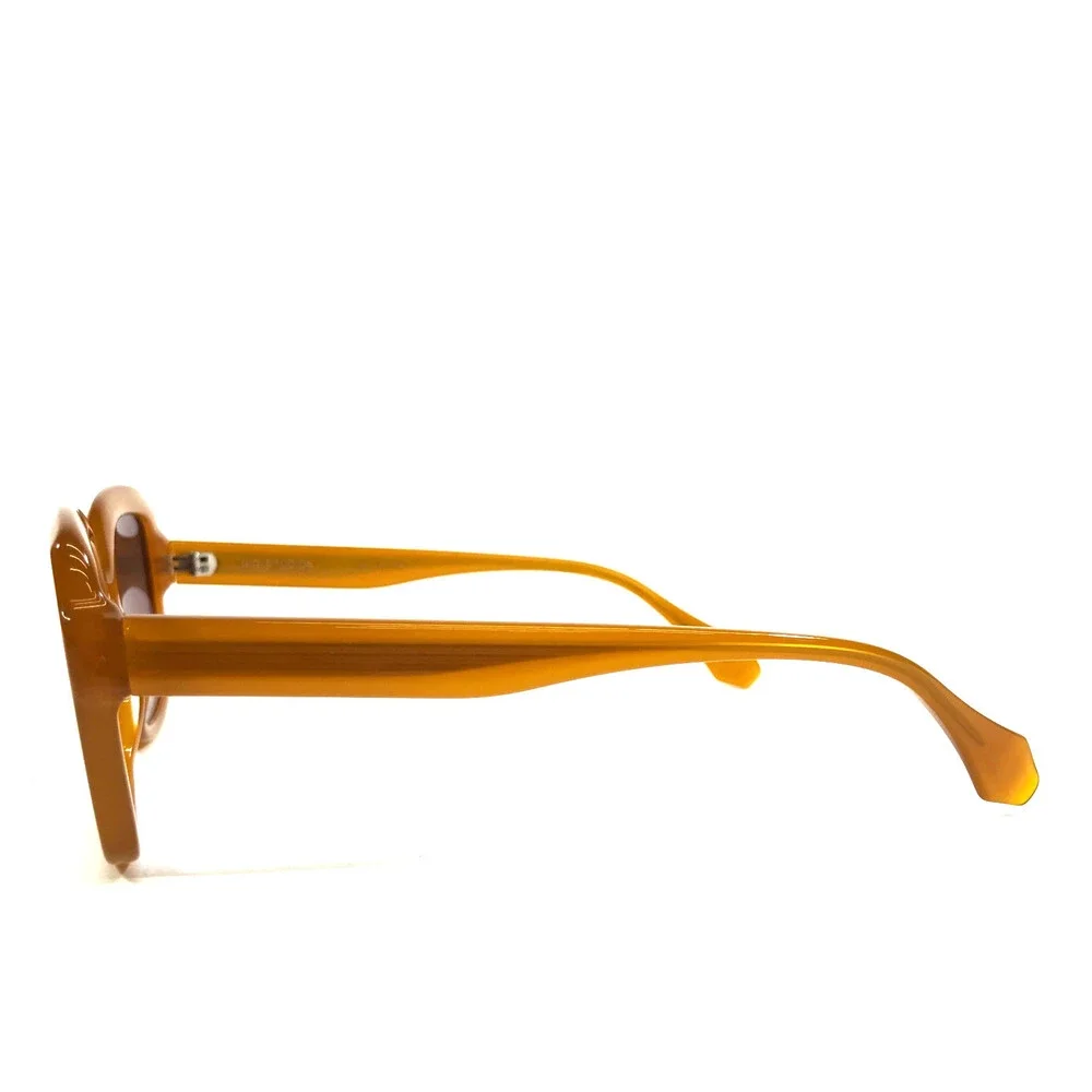Gigi Studios Sunglasses GENESIS 6934/5 Amber Honey Frames Brown Gradient Lenses